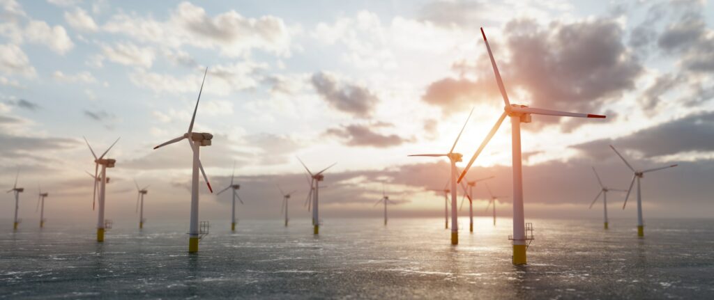 Offshore wind power and energy farm with many wind turbines on the ocean